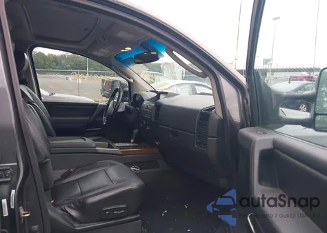 2011 Nissan Titan Sl z USA, uszkodzony, nr VIN 1N6AA0EC0BN318840